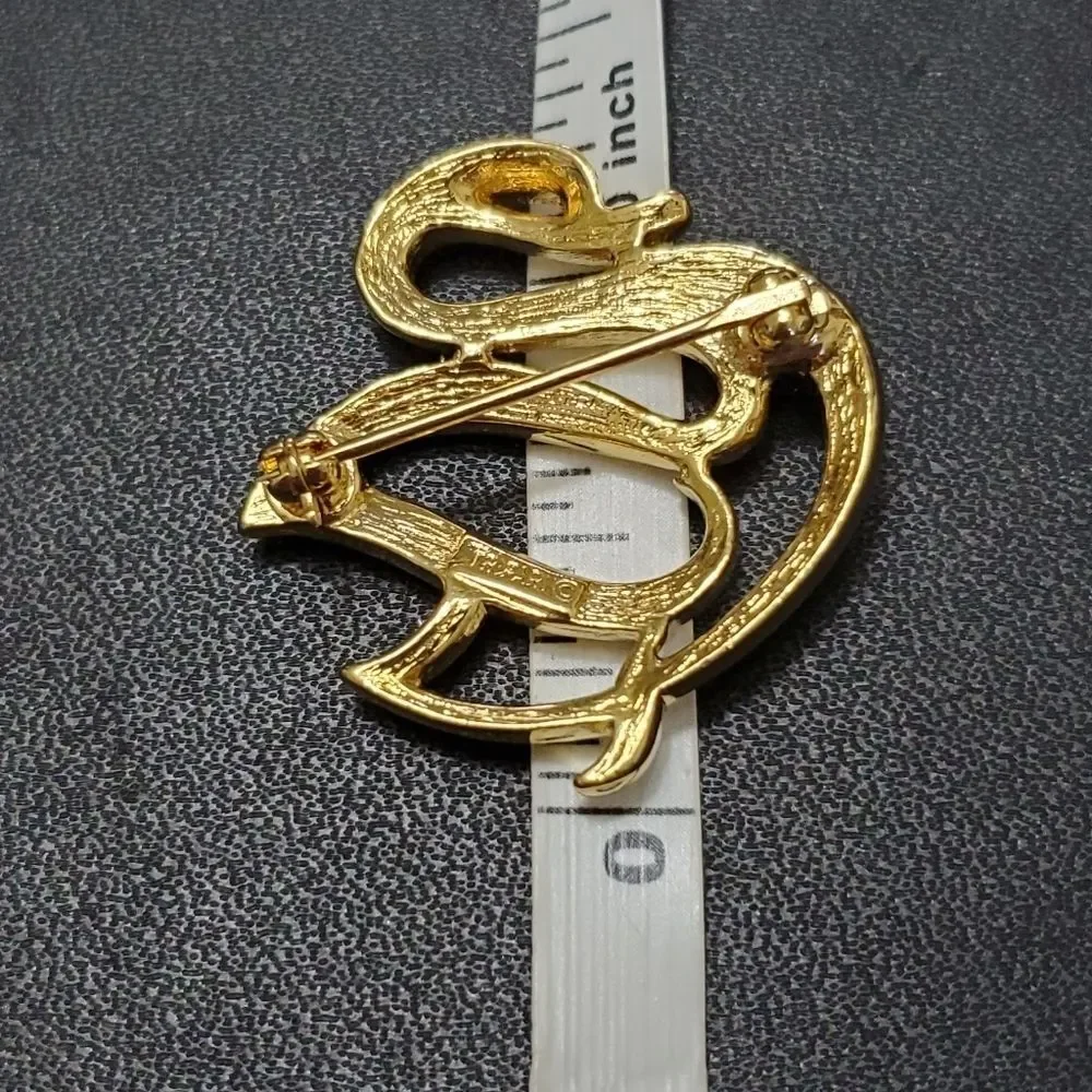 Crown Trifari gold tone swan brooch